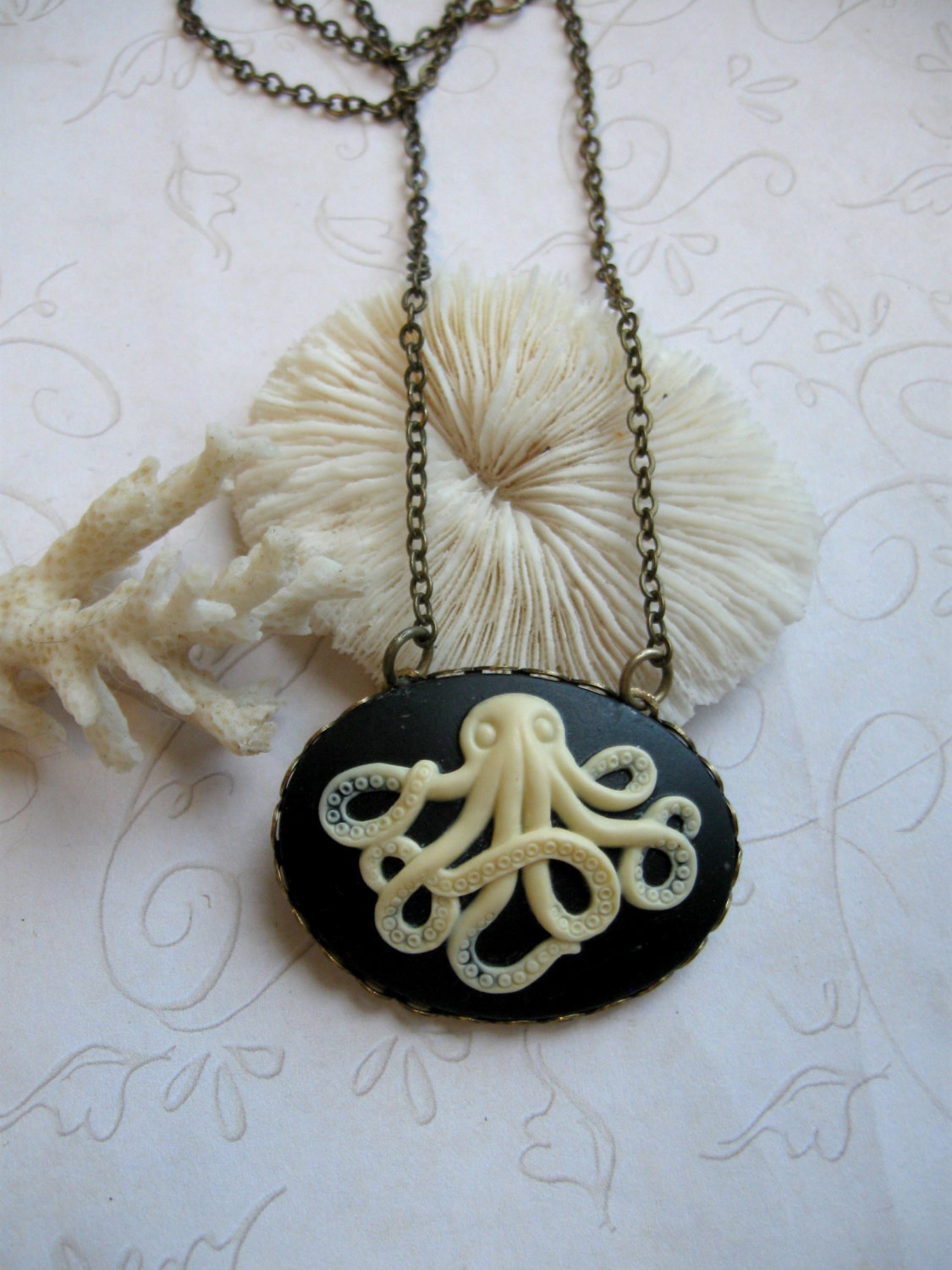 Octopus necklace, black cameo, brass chain